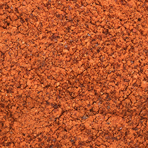 Close-up texture of organic Espelette pepper powder